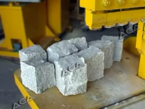 Paving stone machine