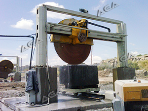 Machine cutting granite block